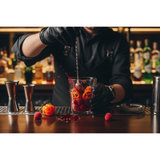 raspberries and  habaneros in a cocktail bar being mixed together